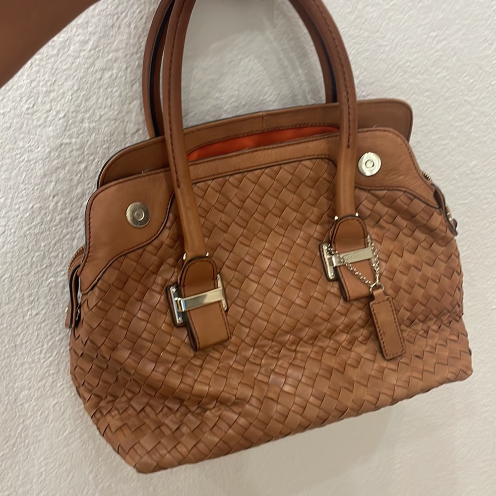 Woven leather Cole Haan purse. Carmel color. Like new condition on inside